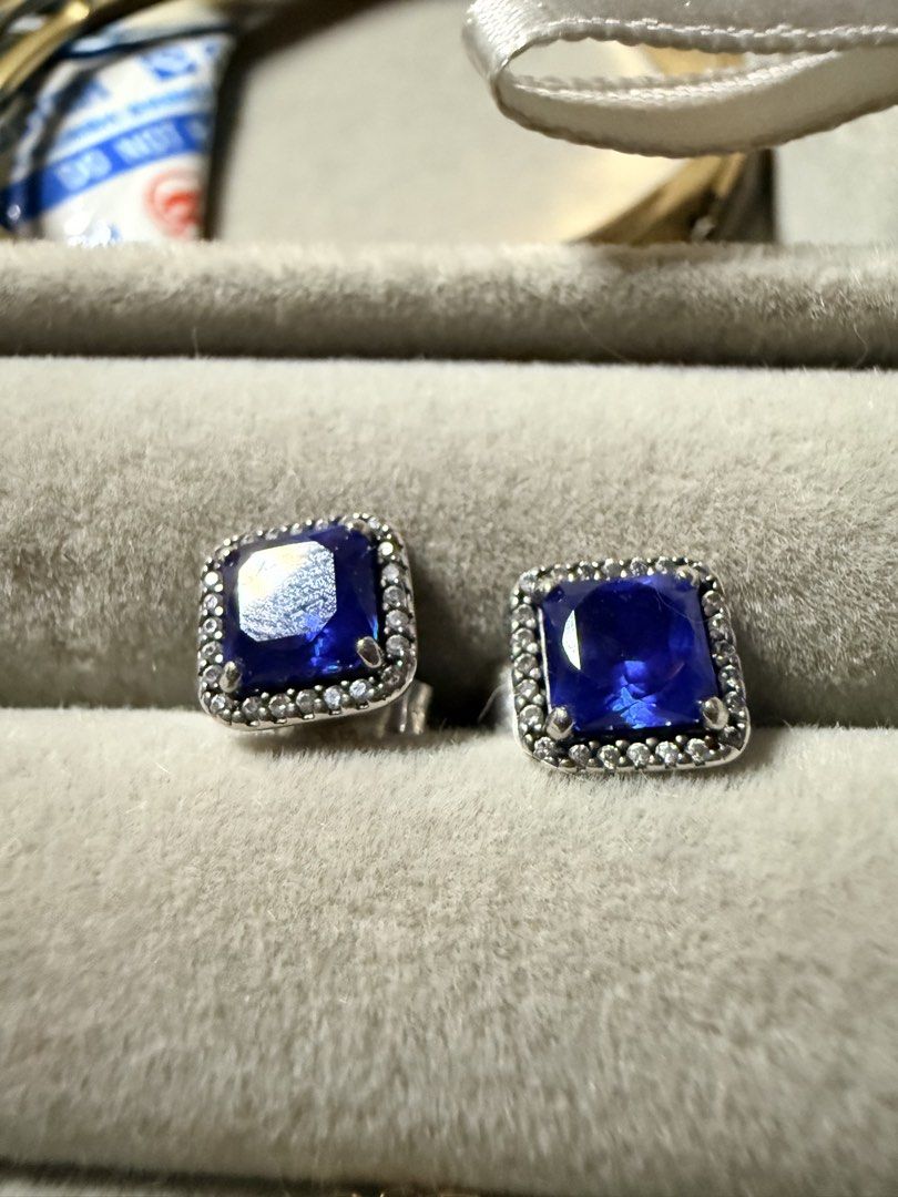 Pandora Sparkling Square Blue Halo Stud Earrings (Category: Earrings) located in Caloocan City. Submitted by shnicky101 (Listing ID 1462464695, Image 2). Description: ✨ Authentic Pandora Sparkling Square Halo Stud Earrings — sterling silver, featuring a deep blue crystal center surrounded by a sparkling cubic zirconia halo. ✅ Preloved, like-new condition, barely worn 📦 Comes with original Pandora gift box ✨ Eye-catching statement piece, perfect 
