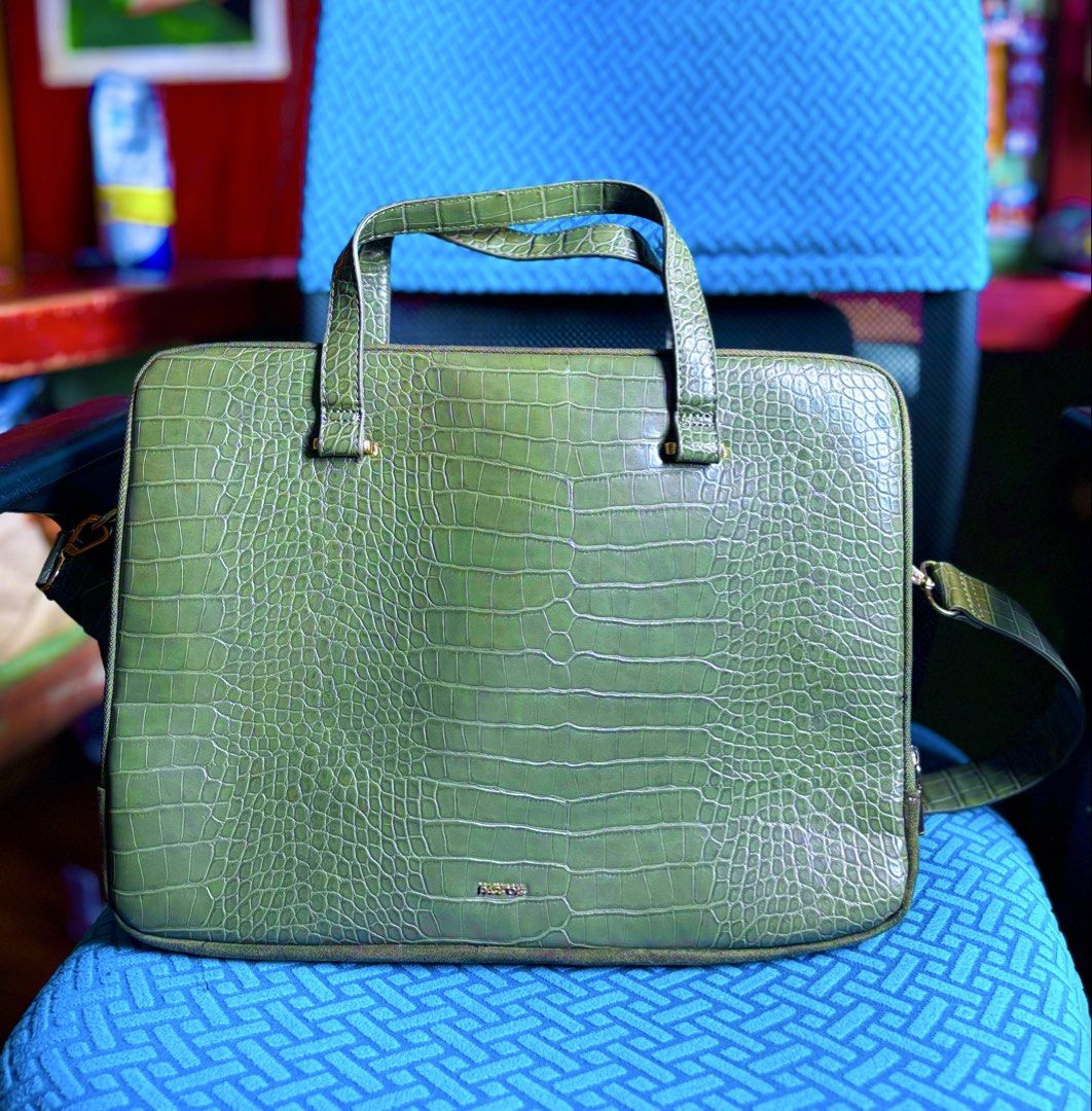 PARFOIS Green Laptop Bag with Shoulder Strap (Category: Laptop Bags & Sleeves) located in Rizal. Submitted by robyngabs (Listing ID 1462468332, Image 1). Description: - SUPER FAVE!! Chic green laptop bag with a cool animal print texture. - Versatile carrying options: comfortable top handles and a detachable shoulder strap. - Spacious interior with 3 compartments for laptop, ipad, etc. - Has wear and tear on one part of the shoulder strap .