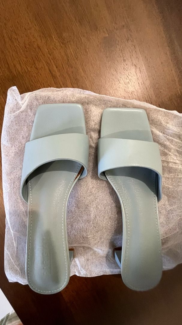 Parisian Light Blue Square Toe Block 2 Inch Heel Slides (Category: Flats & Sandals) located in Pasig City. Submitted by precipitation_ (Listing ID 1462501030, Image 2). Description: DETAILS • Brand: Parisian • Color: Light Blue • Size: 10 • Plain design • Square Toe Block 2 Inch Heel Slides • Original price: ₱1000 • Worn around 2x • Condition: Like New PAYMENT GCash / BPI / BDO / MariBank 📦 Shipping via courier, shouldered by buyer. 📍 Location: