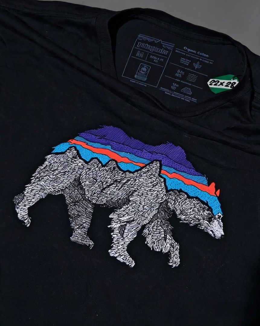 Patagonia - Back for Good Organic Cotton (Category: Tshirts & Polo Shirts ) located in Camalig. Submitted by 50thrifty (Listing ID 1462624482, Image 2). Description: Size : 22x28 M-L This is a black Patagonia Men's Back For Good Organic T-Shirt featuring a detailed graphic of a bear with a mountain backdrop on the front.
