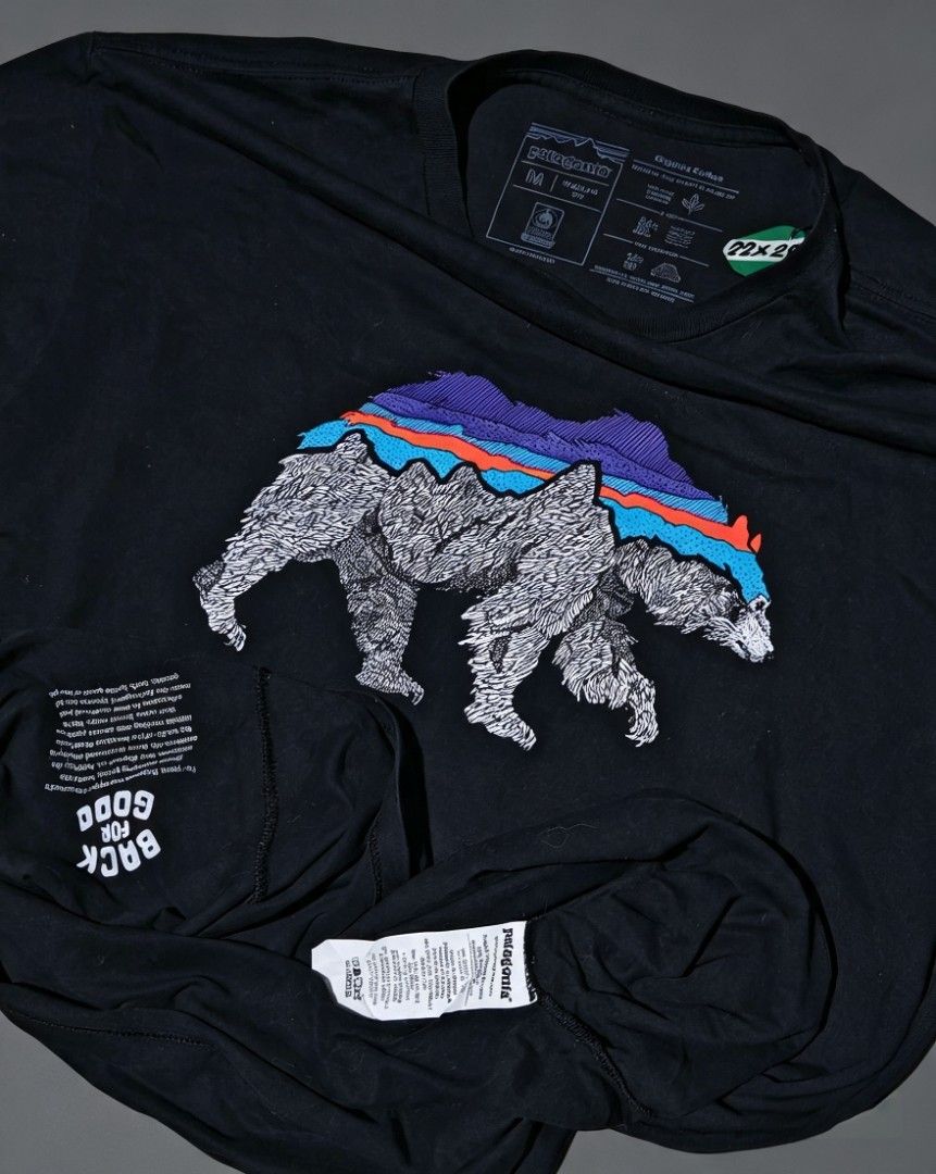 Patagonia - Back for Good Organic Cotton (Category: Tshirts & Polo Shirts ) located in Camalig. Submitted by 50thrifty (Listing ID 1462624482, Image 3). Description: Size : 22x28 M-L This is a black Patagonia Men's Back For Good Organic T-Shirt featuring a detailed graphic of a bear with a mountain backdrop on the front.