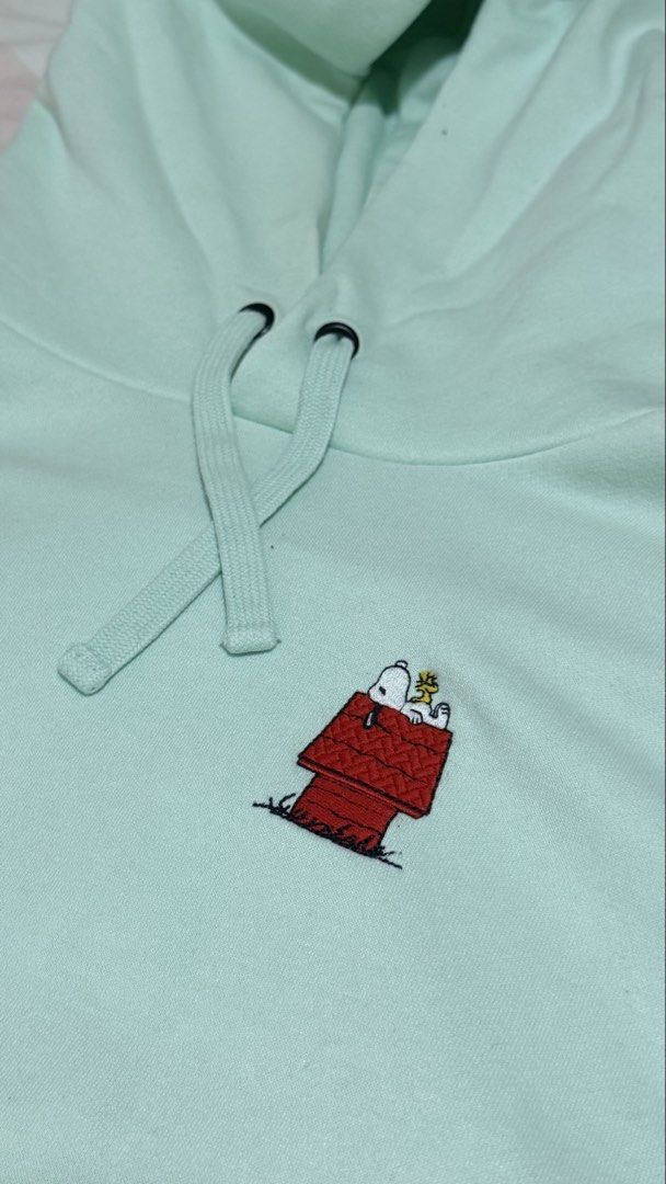 Peanuts Snoopy Mint Green Hoodie in M (Category: Hoodies) located in Quezon City. Submitted by bunnybunbunn (Listing ID 1462613587, Image 2). Description: - Like New. Used twice - Bought in Japan 2022 - See last photo for a marked stain.