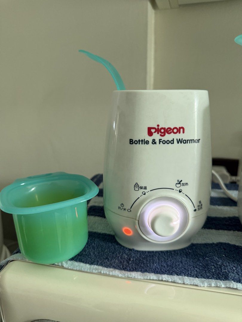 Pigeon Bottle & Food Warmer (Category: Breastfeeding & Bottle Feeding) located in Manila. Submitted by kristielyntan (Listing ID 1462463623, Image 2). Description: - Pigeon Bottle & Food Warmer - Features warming and keeping warm settings - Includes a teal container - Tested and confirmed working - Ideal for warming baby bottles and food -.
