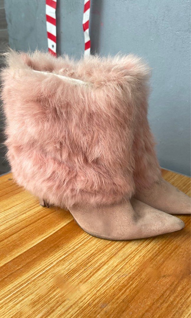 Pink Furry Boots (Category: Boots) located in Manila. Submitted by avriellezaee (Listing ID 1462563218, Image 1). Description: - Adorable pink ankle boots - Soft fuzzy trim detail - Chic pointed toe design - Suede-like material for a stylish look - Moderate heel height for comfort and style - Perfect for nights out or elevating your everyday outfits.