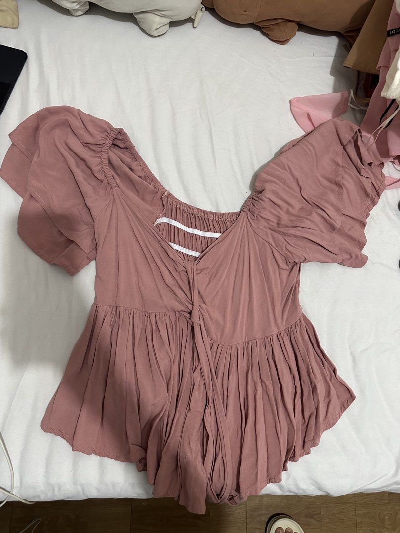 Pink Quinn Butterfly Linen Top (Category: Blouses) located in Mandaluyong City. Submitted by gbtnhc (Listing ID 1462462009, Image 1). Description: Used once - Pink square neckline butterfly sleeve top with adjustable tie front - Elasticated smocking at the back for a comfortable fit - Current price: 280 - LARGE TO XL - RFS: doesn’t fit me anymore.