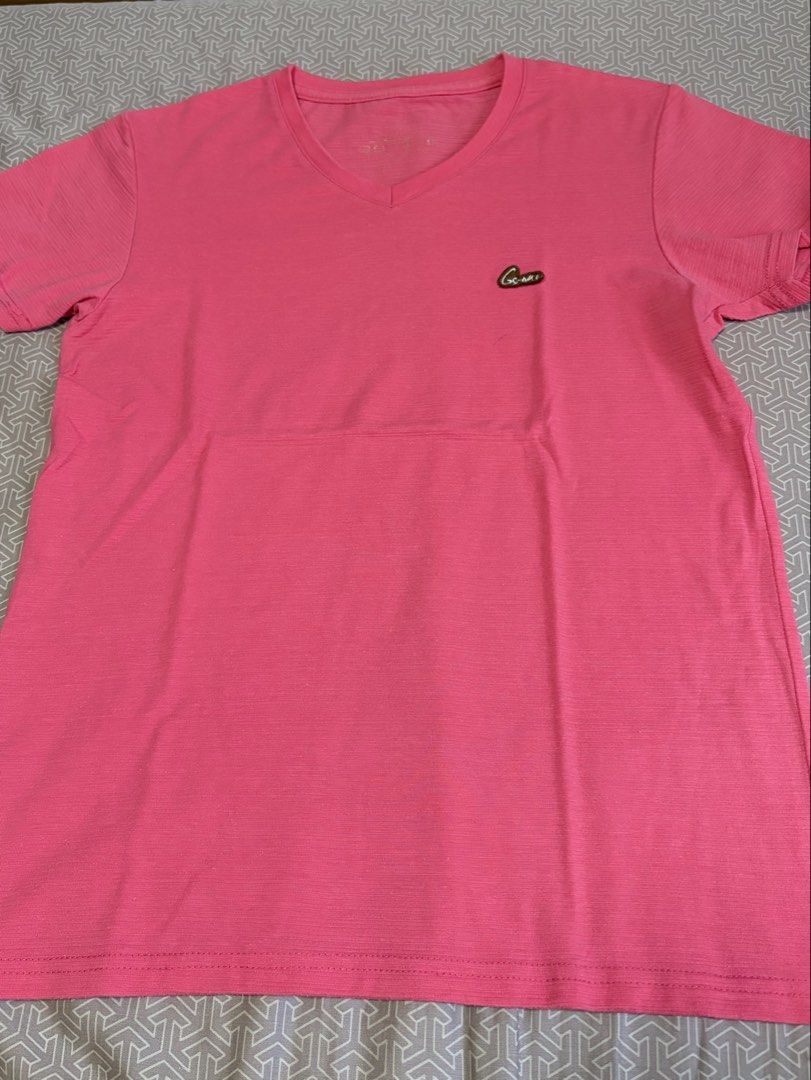 Pink V-Neck T-Shirt (Category: Shirts) located in Manila. Submitted by shopmeph (Listing ID 1462650875, Image 1). Description: - Classic pink v-neck t-shirt - Features a small logo - Made for comfort and everyday casual wear.