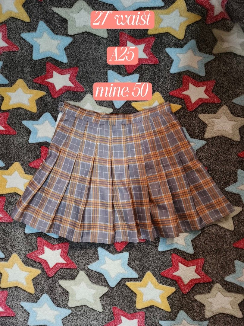 Plaid Pleated Mini Skirt (Category: Skirts) located in Cebu City. Submitted by straw.berry.milk.24 (Listing ID 1462648476, Image 1). Description: - Cute grey and orange plaid pleated mini skirt. - Waist size: 27 inches. - Ideal for casual or preppy looks. - Versatile and easy to style with various tops and shoes. - Selling price: 50..