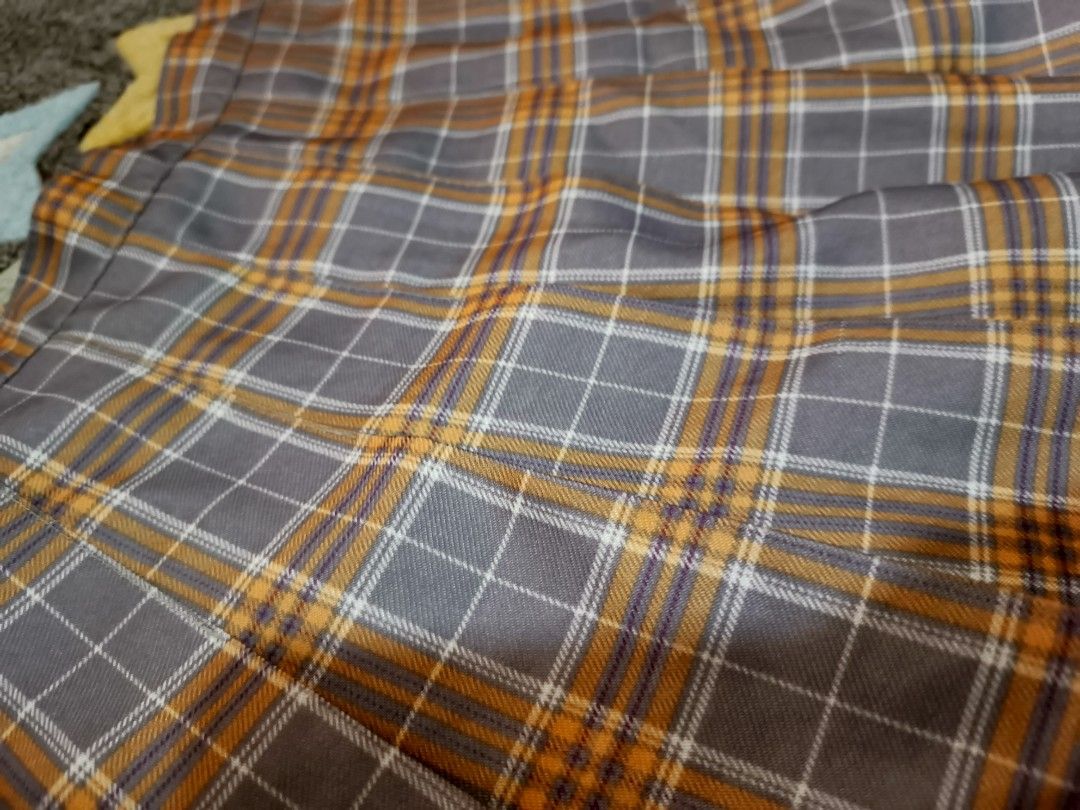 Plaid Pleated Mini Skirt (Category: Skirts) located in Cebu City. Submitted by straw.berry.milk.24 (Listing ID 1462648476, Image 2). Description: - Cute grey and orange plaid pleated mini skirt. - Waist size: 27 inches. - Ideal for casual or preppy looks. - Versatile and easy to style with various tops and shoes. - Selling price: 50..