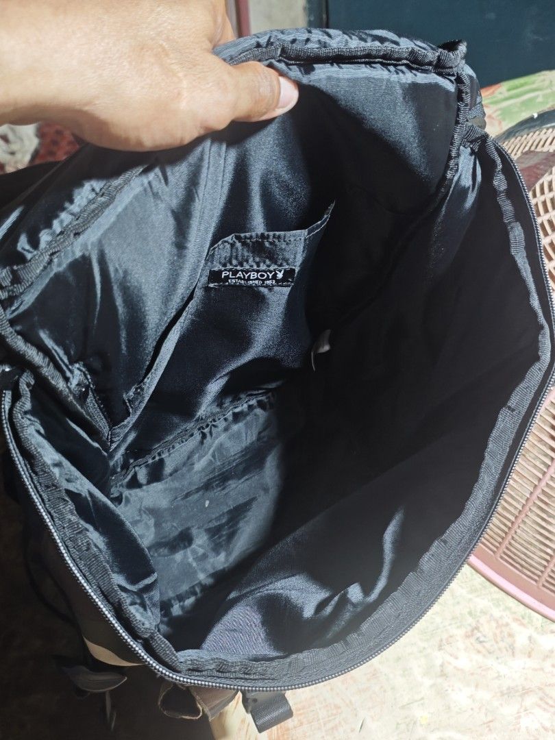 PLAYBOY Camo Backpack (Category: Backpacks) located in San Pedro. Submitted by streetthriftsph (Listing ID 1462571572, Image 3). Description: PLAYBOY Camo Backpack 1650 Shipped Condition: 9.5/10 Size: 14 width X 16.5 Length Compartments: 2 Zippers: 9.5/10 Working Straps: 9.5/10 Intact Colorate; 9.5/10 Print: 9.5/10 Embroidered logo and Cloth Patch.
