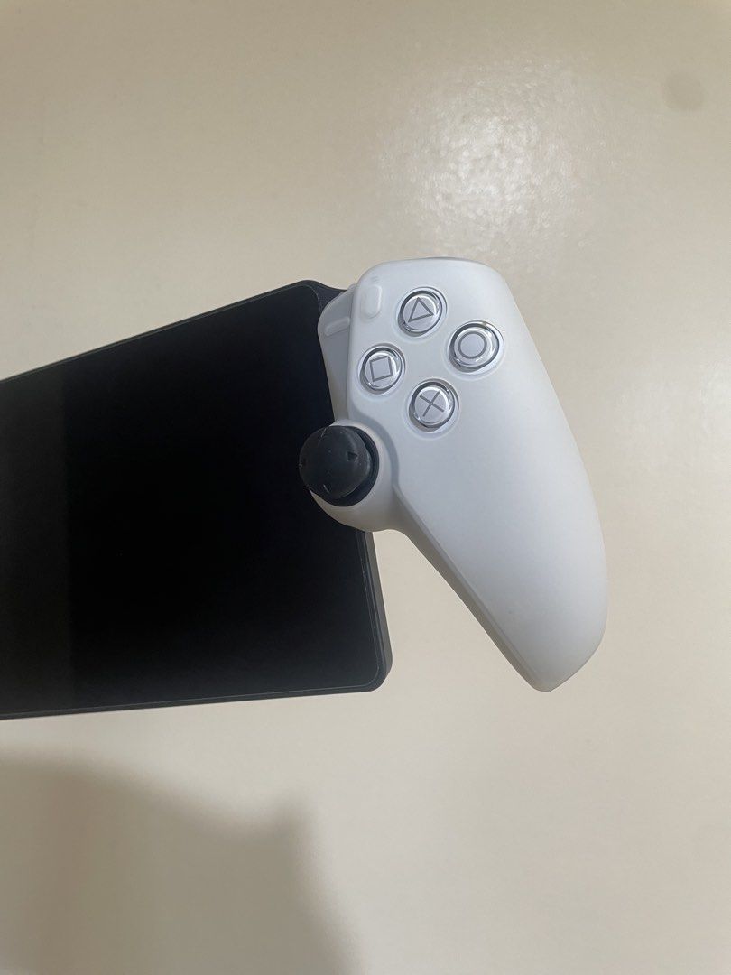 Playstation Portal (Category: Controllers) located in Makati City. Submitted by peaksoda (Listing ID 1462491895, Image 3). Description: Playstation Portal White Slightly used Good condition Pwede sa maselan Complete with box Free Dobe carrying case Free silicon grips Free analog cover For reference - https://ecommerce.datablitz.com.ph/products/sony-playstation-portal-remote-player-for-playstation-5-cfij-18000-jpn SRP price is ₱15,950.00 For sale 