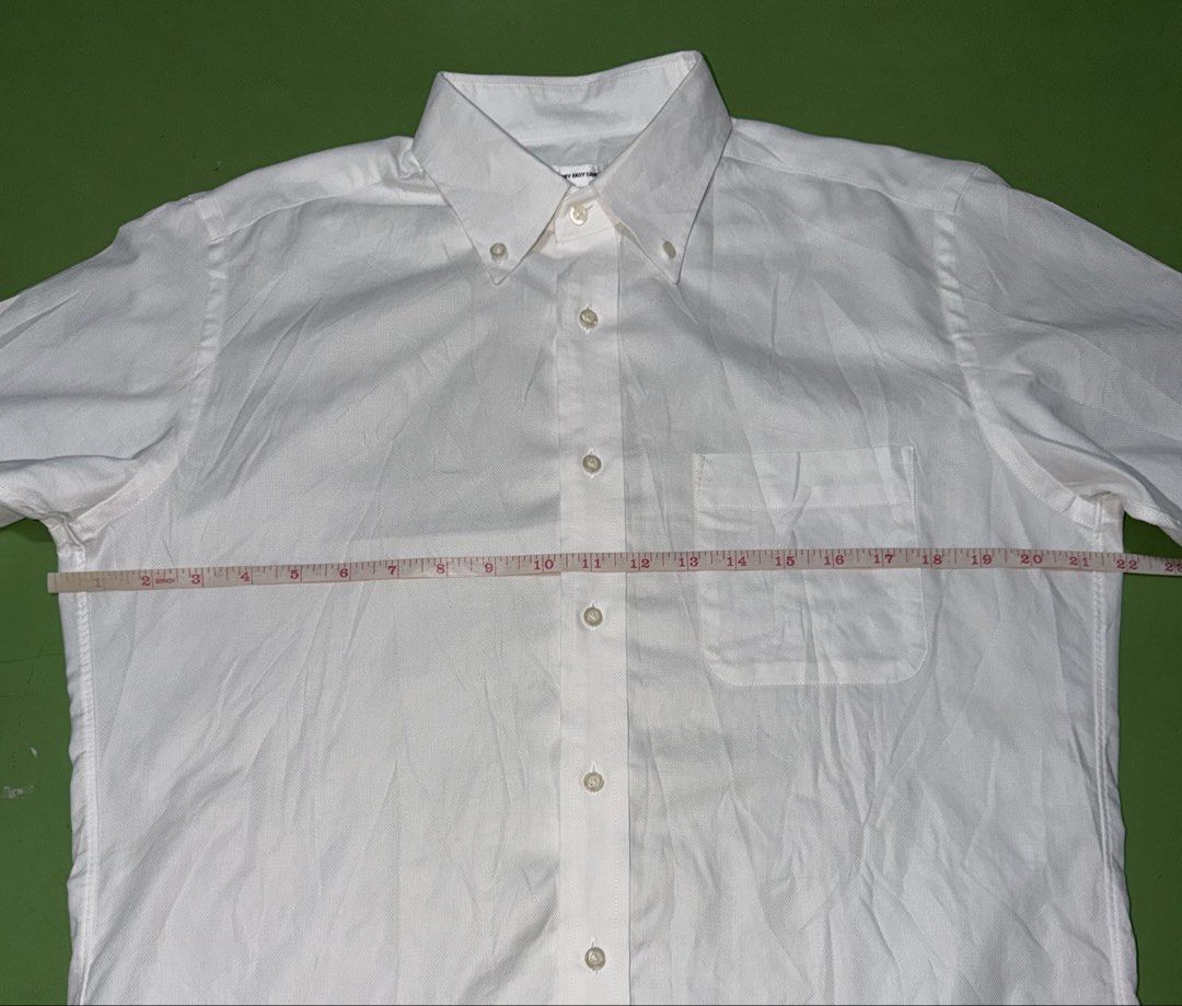 Polo (Category: Formal Shirts) located in Pasig City. Submitted by reyeslarry11740 (Listing ID 1462616864, Image 3). Description: For Sale Uniqlo Polo Dry Easy Care Shirt Men White Size Large 22w x 29L 30.2L Back Good as new condition No issue 450 plus ship only Payment 1st Pasig city .