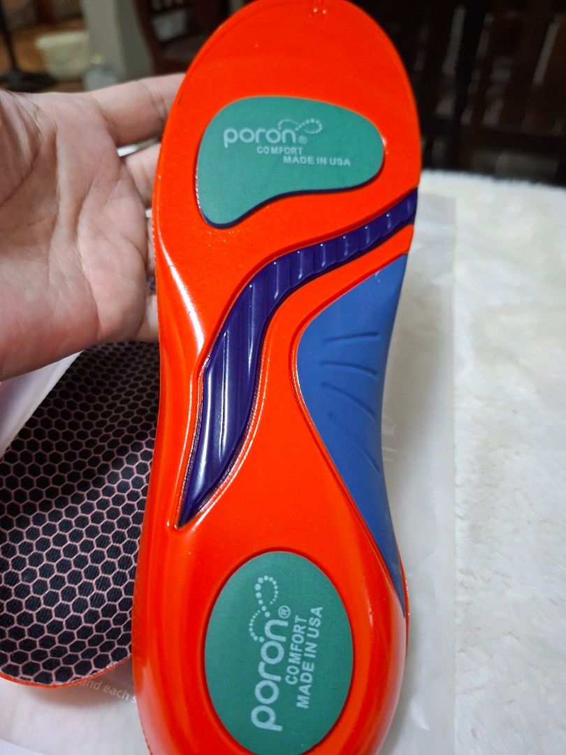PORON COMFORT INSOLE (Category: Shoe inserts & accessories) located in Las Pinas. Submitted by annachiaonair2037 (Listing ID 1462637137, Image 1). Description: This is a pair of Poron shock-absorption shoe insoles featuring a bright orange base with blue arch support and green cushioning pads. MADE IN USA sizes available: 1 PIECE MEDIUM 24.5 - 25 2PCS LARGE 25.5 - 26 Disclaimer: I am not affiliated with, associated with, or authorized by any of t