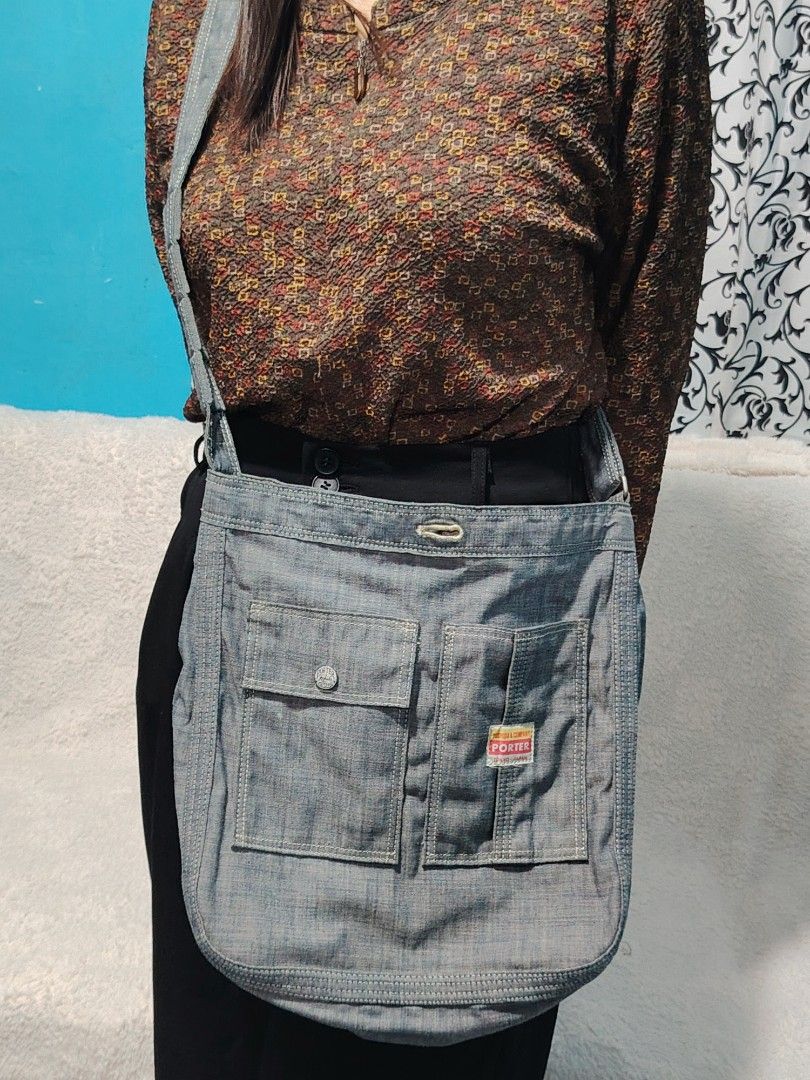 Porter Yoshida & Co. Denim Sling Bag (Category: Sling Bags) located in Manila. Submitted by theshopandsmile (Listing ID 1460190417, Image 1). Description: Details: 📌 Brand: PORTER Yoshida & Company 📌 Color: Blue chambray / washed denim 📌 Adjustable shoulder strap 📌 Front flap pocket + vertical pocket 📌 Top button closure 📌 Spacious interior for daily essentials Condition: Preloved – very good condition with normal signs of use (please refer