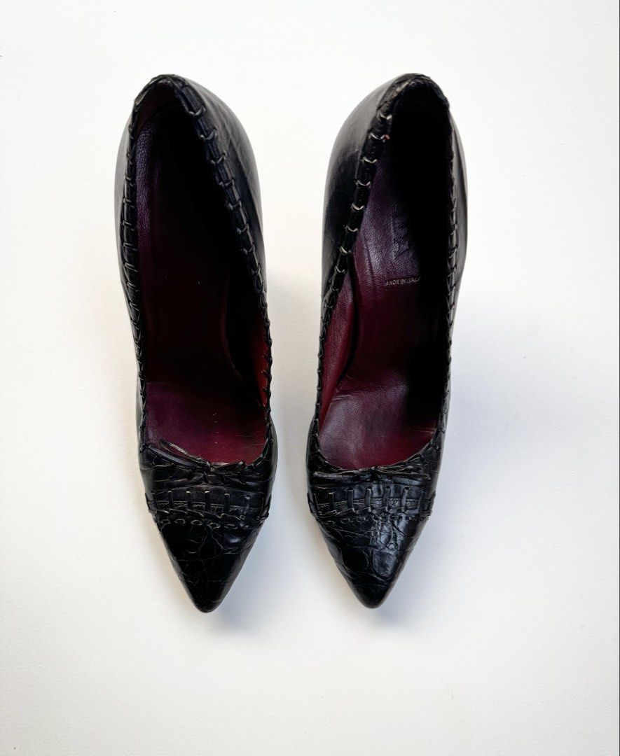 Prada Black Leather Woven Pointed Toe Heels (Category: Heels) located in Davao. Submitted by LUXURY (Listing ID 1462547267, Image 2). Description: Chic and classic black Prada heels. Made in Italy from leather with a woven toe detail and a stiletto heel. Features a red interior lining. Size 36 Pair obly Visit my profile for more luxury items.