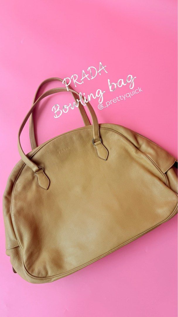 Prada bowler bag 💯authentic (Category: Luxury Bags & Wallets) located in Manila. Submitted by _prettyquick (Listing ID 1462677407, Image 2). Description: preowned pls manage your expectations 100% authentic Follow us on instagram for more items @_prettyquick.