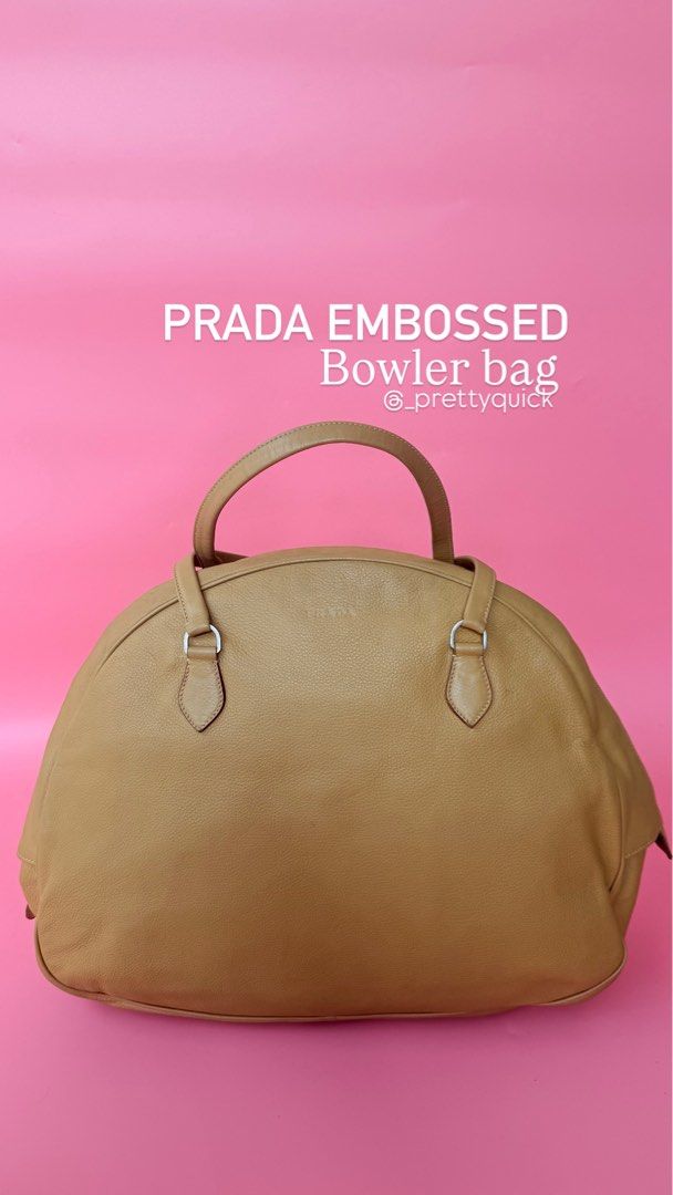 Prada bowler bag 💯authentic (Category: Luxury Bags & Wallets) located in Manila. Submitted by _prettyquick (Listing ID 1462677407, Image 1). Description: preowned pls manage your expectations 100% authentic Follow us on instagram for more items @_prettyquick.