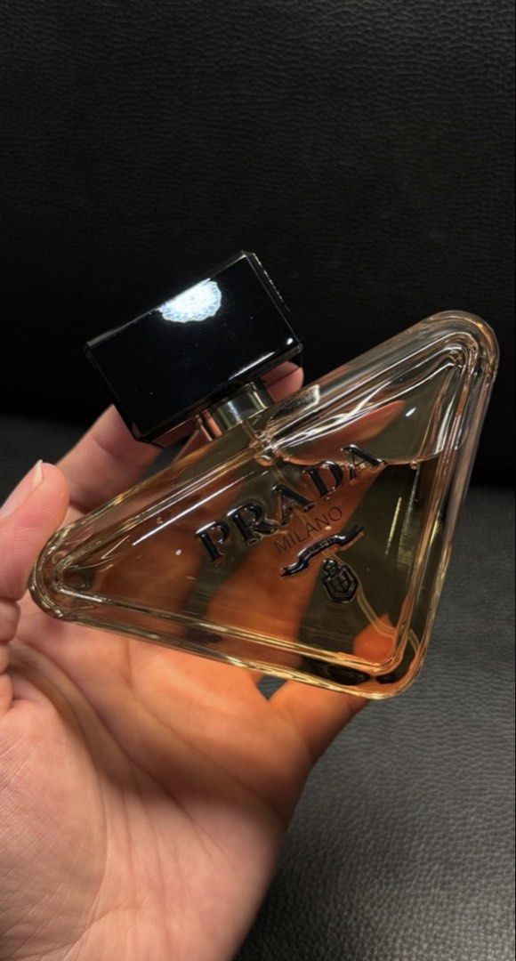 Prada Milano Eau de Parfum for Women (Category: Fragrance & Deodorants) located in Manila. Submitted by ambrocioc91976 (Listing ID 1462472320, Image 1). Description: - Authentic Prada Milano Perfume - Distinctive triangular bottle design - Elegant black cap - Warm and inviting amber fragrance - Versatile for daily use or special events .