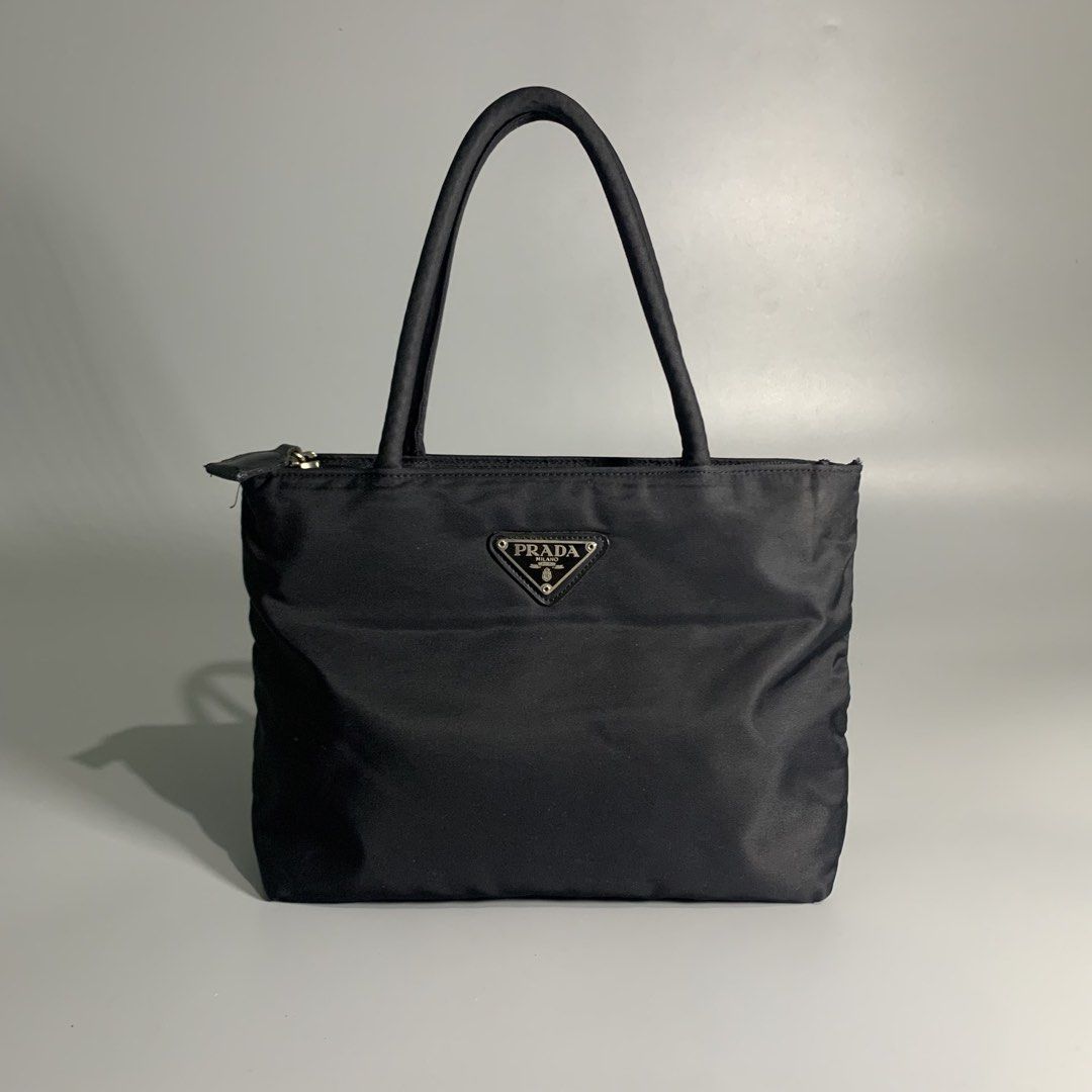 Prada tessuto nylon mini (Category: Luxury Bags & Wallets) located in Davao. Submitted by jandyfuert21303 (Listing ID 1462630327, Image 1). Description: Excellent condition No issues Off only Super pretty in person .