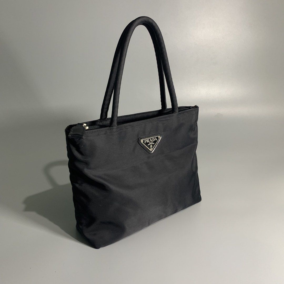 Prada tessuto nylon mini (Category: Luxury Bags & Wallets) located in Davao. Submitted by jandyfuert21303 (Listing ID 1462630327, Image 3). Description: Excellent condition No issues Off only Super pretty in person .