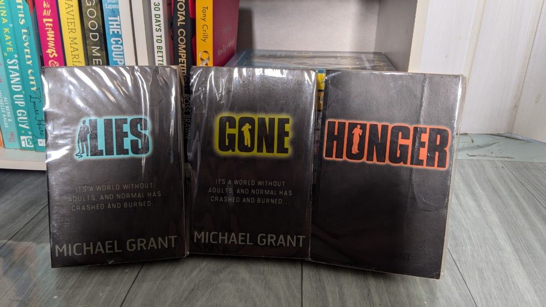 preloved book bundle (Category: Storybooks) located in Rizal. Submitted by maggotsforthebrain (Listing ID 1461689853, Image 1). Description: The bundle includes 3 books of Michael Grant's Gone series. please note that this may also have some minimal foxing, tanning, and spine crease. MOP: maribank/maya/qrph MOD: jnt (shipping fee shouldered by the buyer.