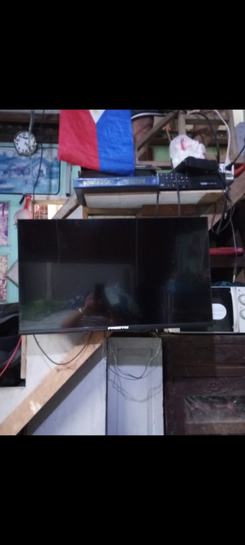PRESTIZ 32 INCHES Smart TV (Category: TV) located in Caloocan City. Submitted by honest.1 (Listing ID 1462552988, Image 2). Description: - 32 inches - Works well, great for gaming or watching shows - Built-in YouTube and other apps - Clear and bright screen - Includes power cord - Ready for a new home.