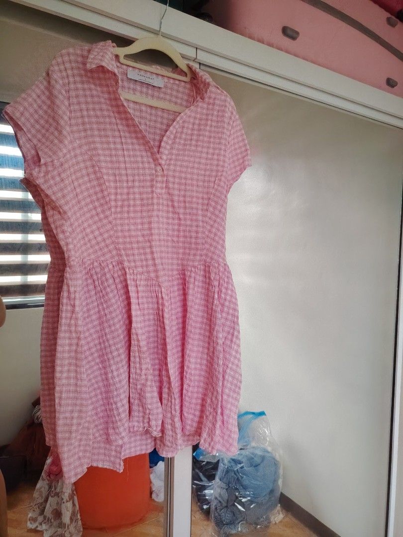 Primark Pink Gingham Collared Short Sleeve Dress (Category: Dresses) located in Agdangan. Submitted by limeineghl (Listing ID 1462506188, Image 1). Description: - Adorable pink gingham print - Brand: Primark - Features short sleeves and a collared neckline with button detail - Flowy, gathered skirt for a comfortable and stylish look - Ideal for casual wear, day trips, or a picnic - Versatile styling with sneakers or sandals.