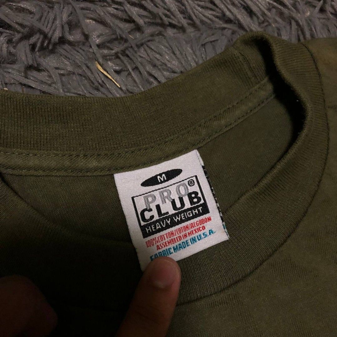 Proclub (Dark Green) Shirt (Category: Tshirts & Polo Shirts ) located in Camiling. Submitted by thriftscape2024 (Listing ID 1462567167, Image 2). Description: Excellent Condition Color rate: 9/10 Issue: ❌❌❌ Dimes: W19xL27.