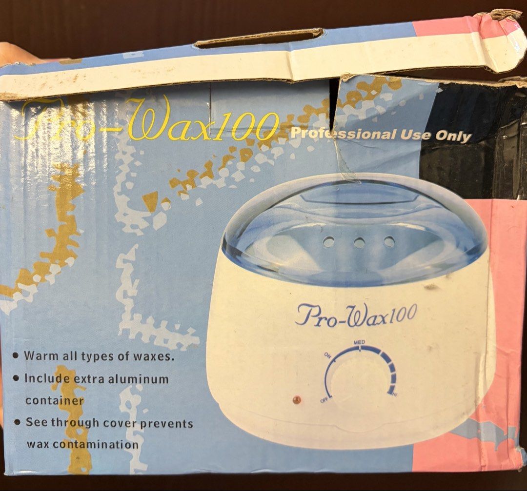Pro-Wax100 Professional Wax Heater (Category: Hair) located in Balanga. Submitted by chirirai (Listing ID 1462615086, Image 1). Description: - Pro-Wax100 Wax Heater - Warms all types of waxes - Comes with an extra aluminum container - See-through cover - Ideal for professional salon use -Used only once -Rfs: Not using anymore, can’t remove the other wax residue -with free trial wax and Nanny rose, resdy to use wax expiring on November 2026 .