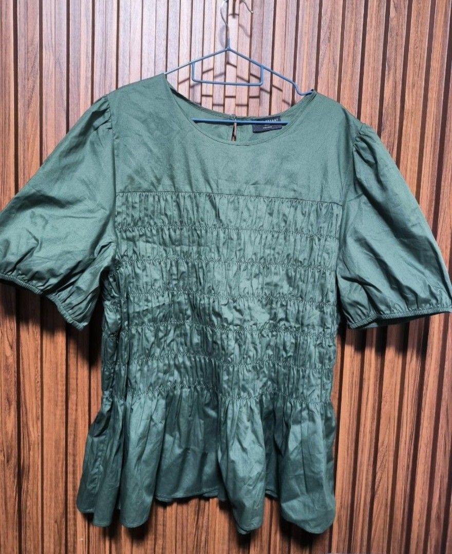 Puff-sleeve smocked peplum blouse (Category: Blouses) located in General Mariano Alvarez. Submitted by plussize_republic (Listing ID 1462643765, Image 1). Description: brand new without hang tag best fit to 4x-5x also available in brown -white stripes shipping fee c/o buyer.