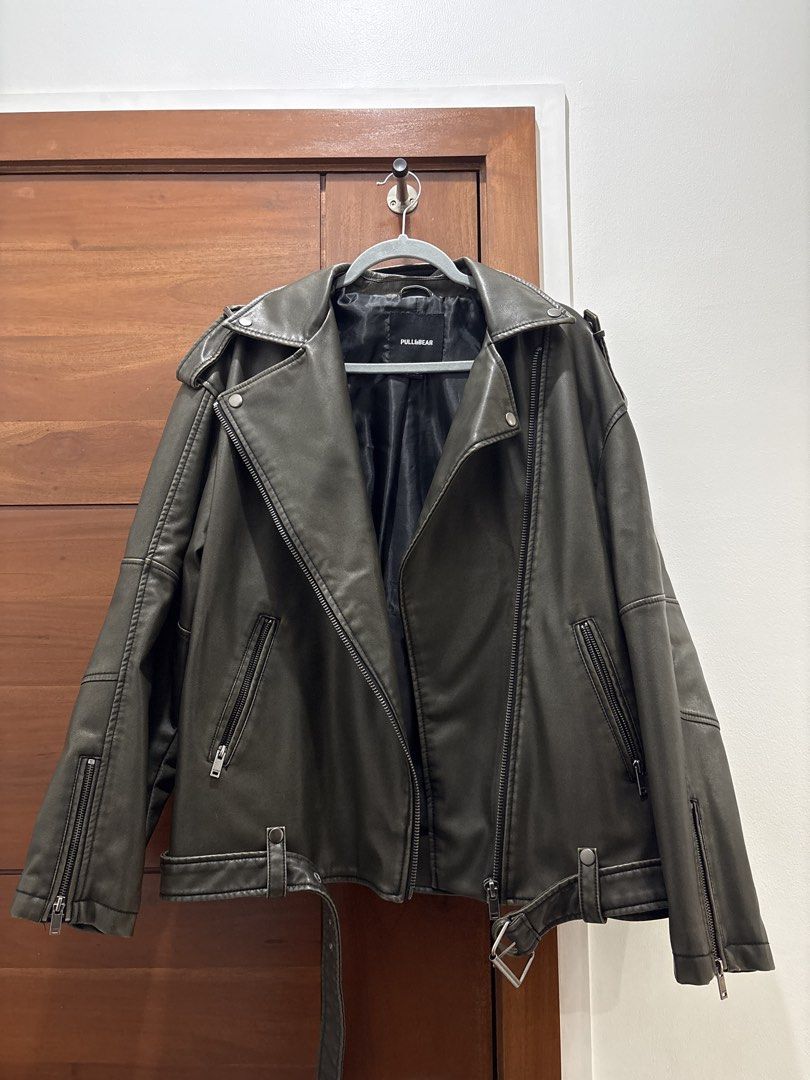 PULL&BEAR Faux Leather Biker Jacket (Category: Coats, Jackets and Outerwear) located in Paranaque City. Submitted by kaescloset.18 (Listing ID 1462609207, Image 3). Description: - used during a trip - faux leather biker jacket - Oversized fit - comes with a removable belt - Zip pockets on front and sleeves .