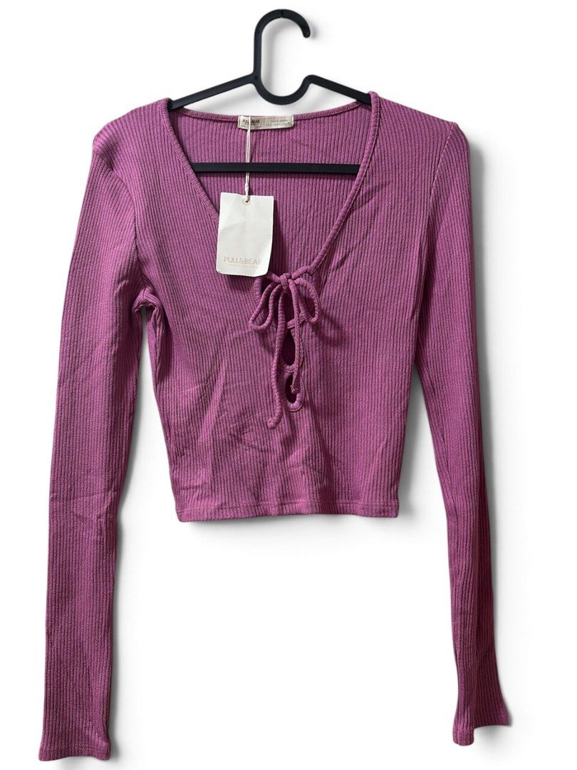Pull&Bear ribbed tie-front long-sleeve crop top (Category: Longsleeves) located in Santol. Submitted by lululane (Listing ID 1462623881, Image 2). Description: Xs-L Stretchable .