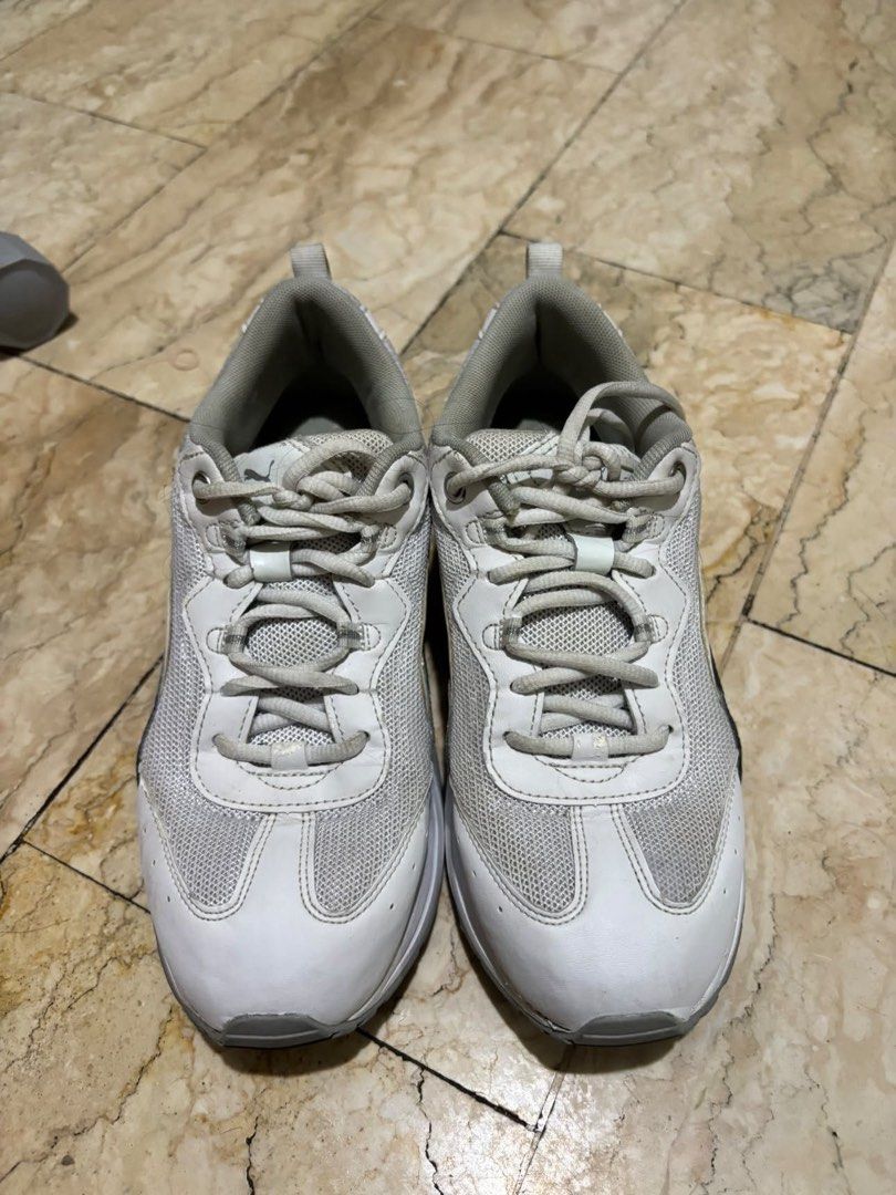 Puma Celia US 8 White Sneakers (Category: Sneakers) located in Quezon City. Submitted by GlamourD (Listing ID 1462505918, Image 1). Description: - White Puma sneakers - Lace-up style - Ideal for everyday wear or light workouts - Shows minor scuffs and dirt from regular use - Plenty of life left - Sold as is, still with box. .