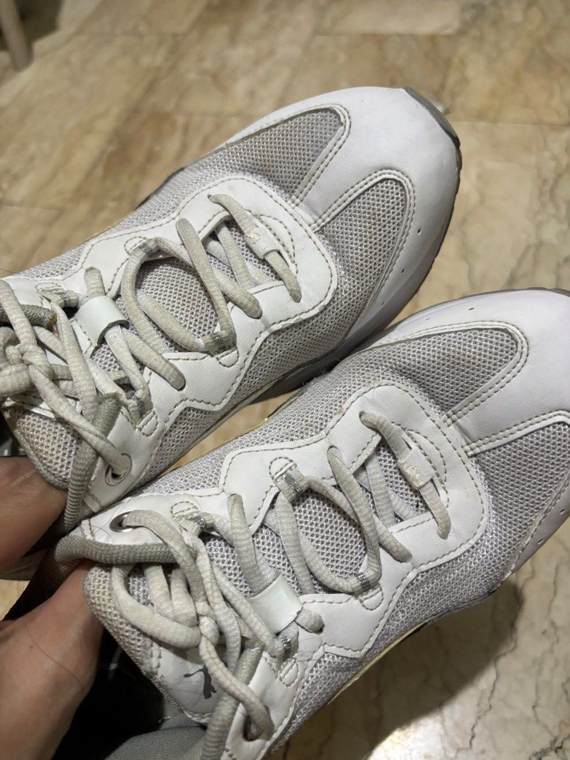 Puma Celia US 8 White Sneakers (Category: Sneakers) located in Quezon City. Submitted by GlamourD (Listing ID 1462505918, Image 3). Description: - White Puma sneakers - Lace-up style - Ideal for everyday wear or light workouts - Shows minor scuffs and dirt from regular use - Plenty of life left - Sold as is, still with box. .