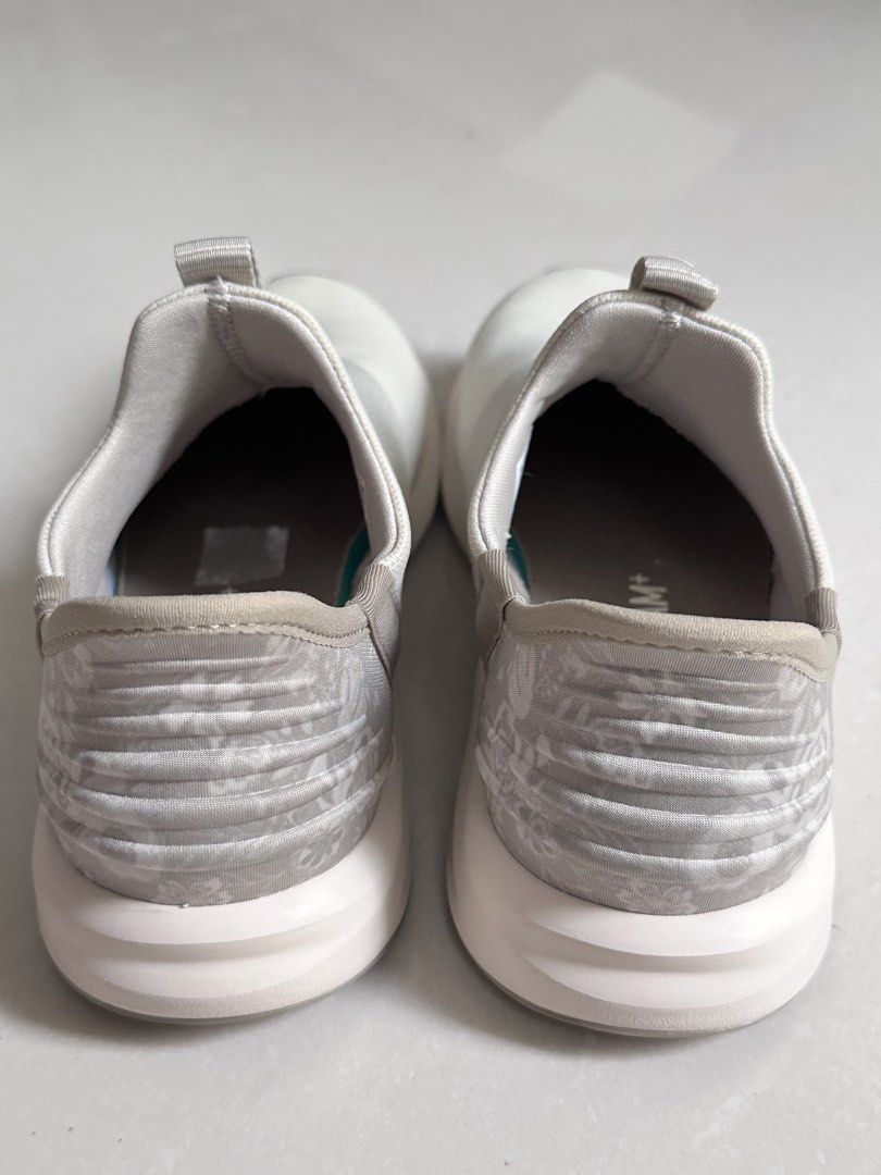 Puma Prowl 2 Ease In Botanical HL Sneakers (Category: Sneakers) located in Cagayan de Oro. Submitted by divinephoenix (Listing ID 1462605305, Image 3). Description: - Puma Prowl 2 Ease sneakers - Size 6.5 - Color: Light Grey with Botanical Print - Style: Slip-on with elastic straps for a secure fit - Comfort: Features SoftFoam+ sockliner - Versatile: Ideal for casual wear or light workouts - Condition: Comes with original box.