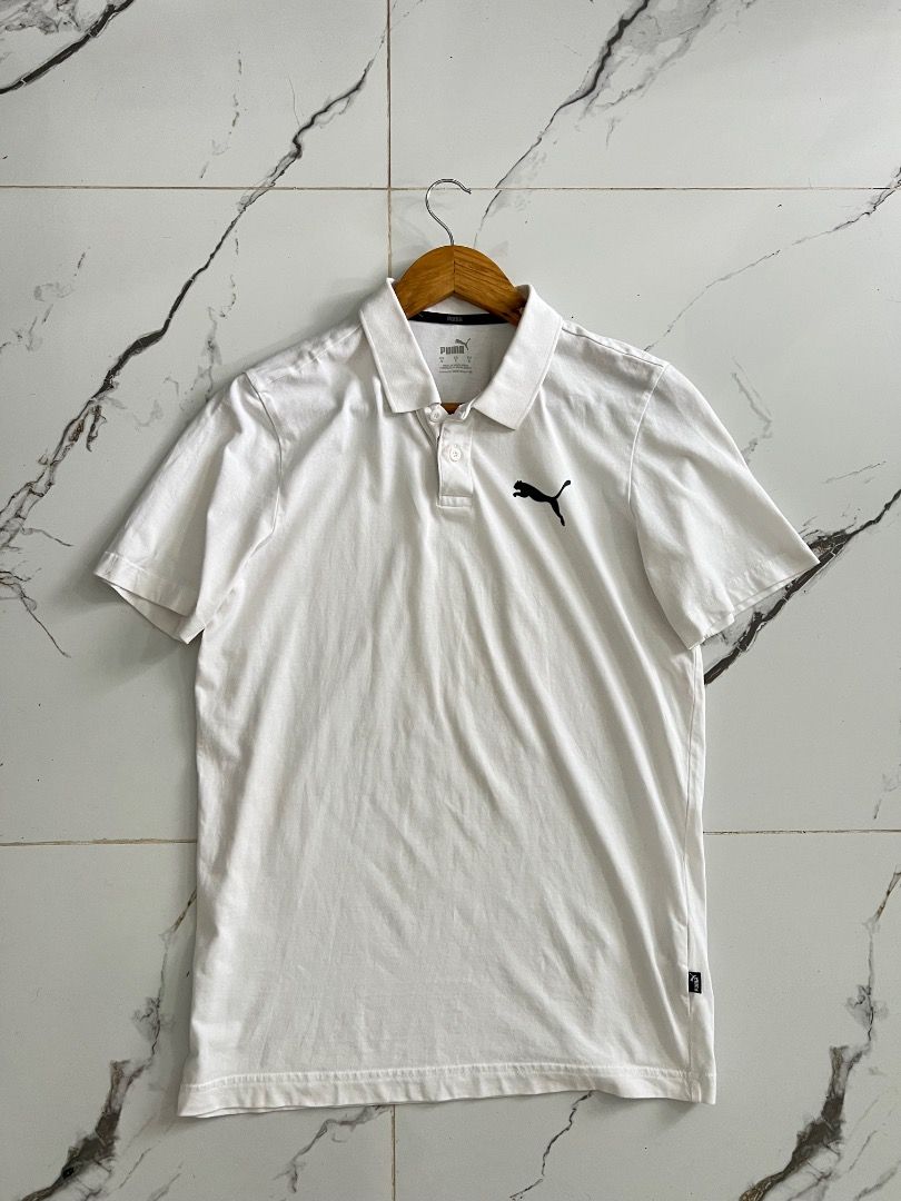 Puma White Polo Shirt - Size S (Category: Tshirts & Polo Shirts ) located in Baguio. Submitted by pureearth.5f1c08 (Listing ID 1462539011, Image 2). Description: - White Puma polo shirt - Medium for women - Classic Puma logo on chest - Made in Bangladesh - Size S (US/CA/EU) - Ideal for casual or sporty wear - Simple and comfortable design.