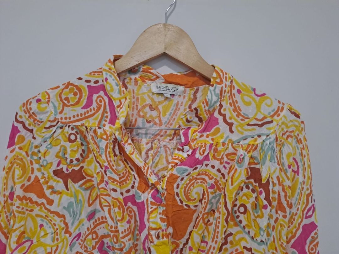 Rachel Zoe crop (Category: Others Tops) located in Mandaluyong City. Submitted by epicowl-c93c (Listing ID 1462582134, Image 2). Description: This item is a Rachel Zoe Paisley Tie-Front Cropped Blouse, a lightweight bohemian-style garment known for its vibrant yellow, pink, and orange color palette.