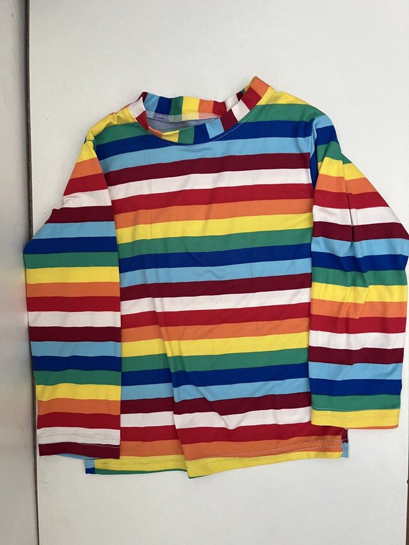 Rainbow Striped Long Sleeve Shirt (Category: Longsleeves) located in Las Pinas. Submitted by chelcie.sindhy (Listing ID 1462456680, Image 1). Description: - Vibrant rainbow stripe pattern all over - Long sleeves for extra warmth and style - Soft and comfortable material, perfect for kids - Ideal for everyday wear or as a fun layering piece - Easily pairs with jeans or shorts for a complete outfit.