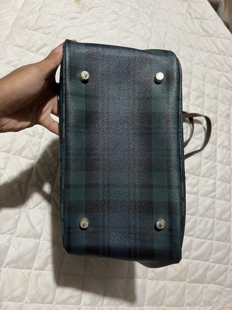 Ralph Lauren Plaid Tote Bag (Category: Luxury Bags & Wallets) located in Muntinlupa City. Submitted by cutiepie143 (Listing ID 1462616008, Image 2). Description: - Classic Ralph Lauren tote bag - Navy and green plaid pattern - Genuine leather trim and handles - Protective metal feet on the bottom - Multiple interior pockets for organization - Ideal for everyday use.