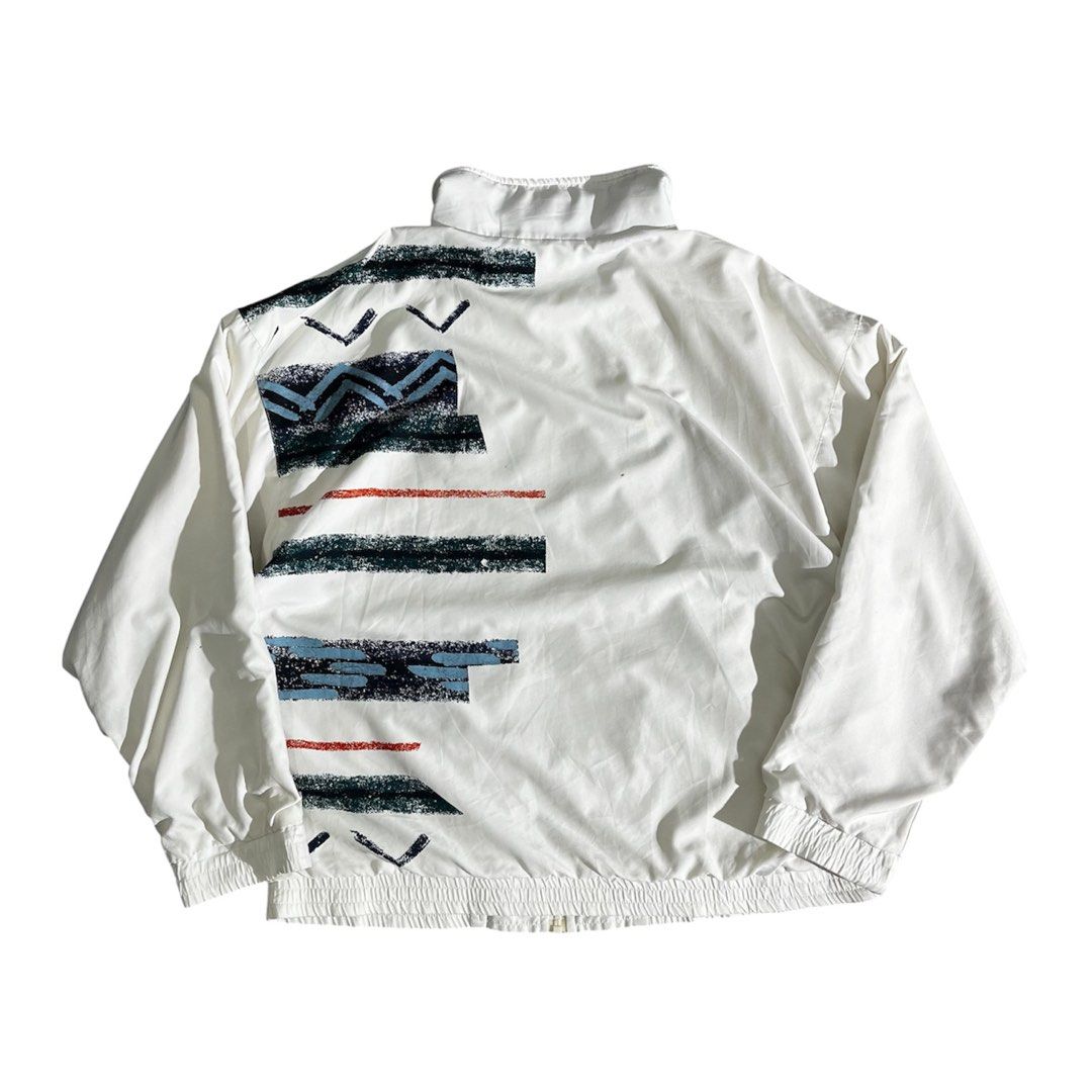 RARE!! Vintage Adidas Asymmetrical Geometric Pattern Windbreaker (Category: Coats, Jackets and Outerwear) located in Daraga. Submitted by th3cliquejunks (Listing ID 1462647647, Image 2). Description: RARE!! Vintage Adidas Asymmetrical Geometric Pattern Windbreaker Tagged Size: Large Condition: 9/10 Signs of usage. No major flaw Loose ribbings Measurement: Pit to pit: 23” Length: 26-27” - 3,000 Dm!.