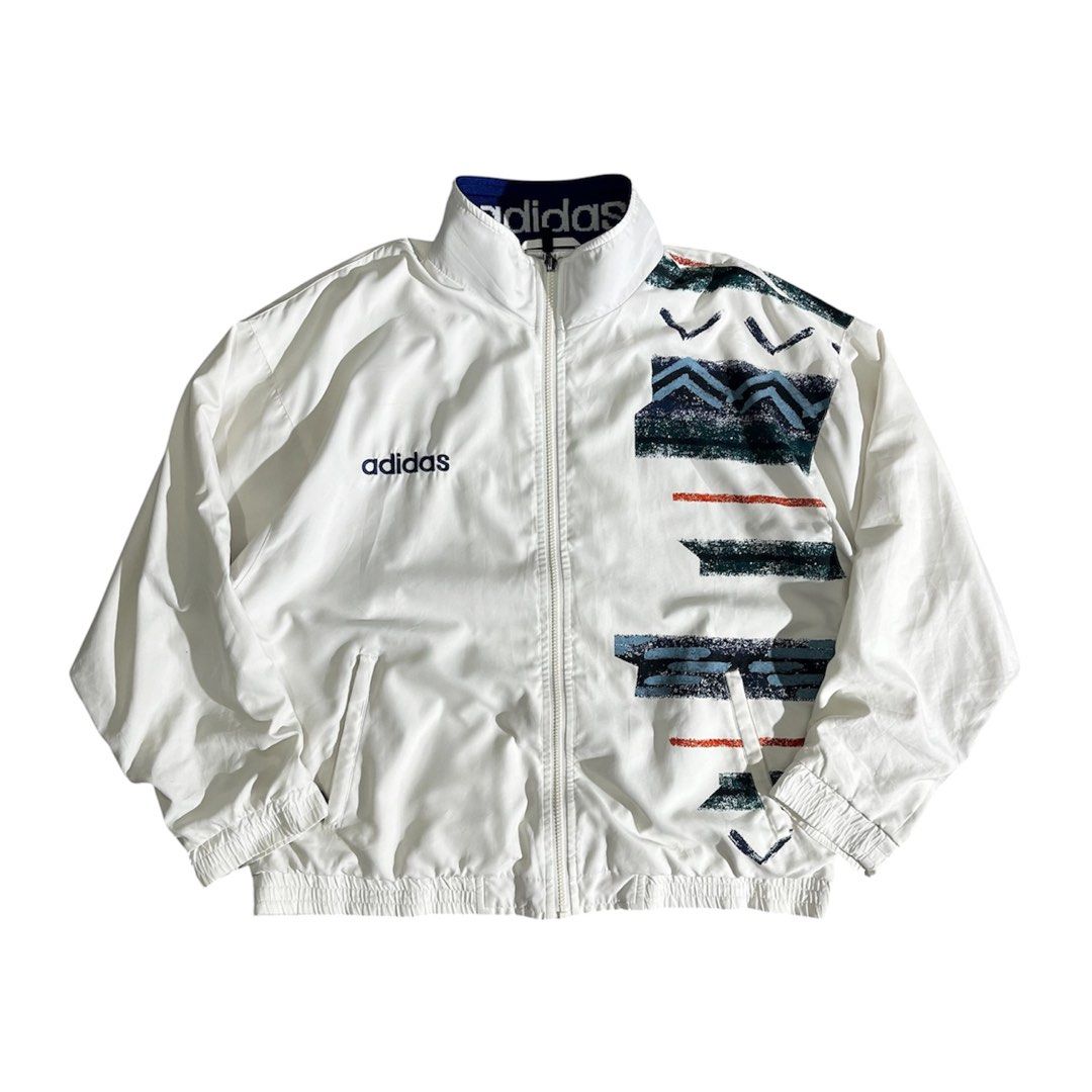 RARE!! Vintage Adidas Asymmetrical Geometric Pattern Windbreaker (Category: Coats, Jackets and Outerwear) located in Daraga. Submitted by th3cliquejunks (Listing ID 1462647647, Image 1). Description: RARE!! Vintage Adidas Asymmetrical Geometric Pattern Windbreaker Tagged Size: Large Condition: 9/10 Signs of usage. No major flaw Loose ribbings Measurement: Pit to pit: 23” Length: 26-27” - 3,000 Dm!.