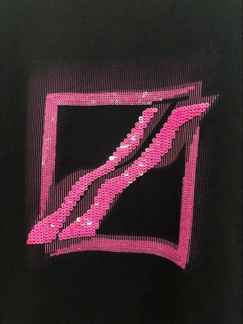 Rare WE11DONE Sequin Logo Graphic Tee Black L (Authentic) (Category: Tshirts & Polo Shirts ) located in Manila. Submitted by ylsrarities (Listing ID 1462538689, Image 2). Description: Features a bold pink sequin WE11DONE graphic on the front with a subtle rubberized WE11DONE logo patch near the lower back. • Size L • Black • 100% Cotton • Pink sequin graphic • Rubberized logo patch at lower back • Crewneck • Short sleeves • Oversized / relaxed bo