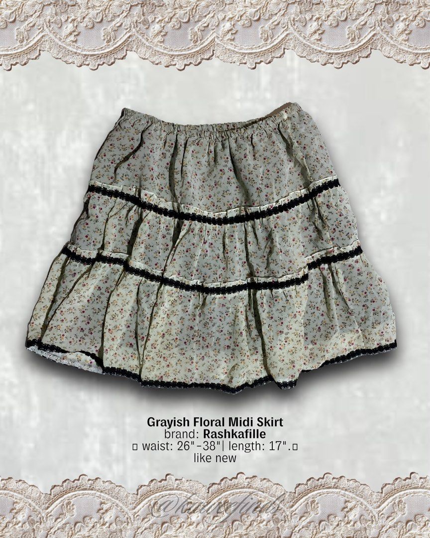 Layered Floral Midi Skirt (Category: Activewear) located in Paranaque City. Submitted by kuweefindsmnl (Listing ID 1462606545, Image 1). Description: - Adorable tiered midi skirt - Pretty grayish floral print - Black lace trim on each tier - Comfortable elasticated waistband - Waist: 26"-38" - Length: 17" - Includes black lining - Ideal for cottagecore or fairy kei aesthetics.