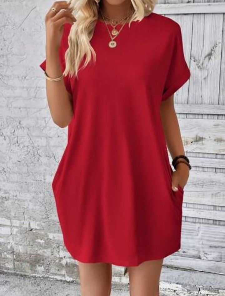 Red dress Large (Category: Dresses) located in Cabanatuan. Submitted by miss.maia (Listing ID 1462625945, Image 1). Description: The image shows a vibrant red short-sleeve sheath dress with a rounded neckline and cuffed sleeves..