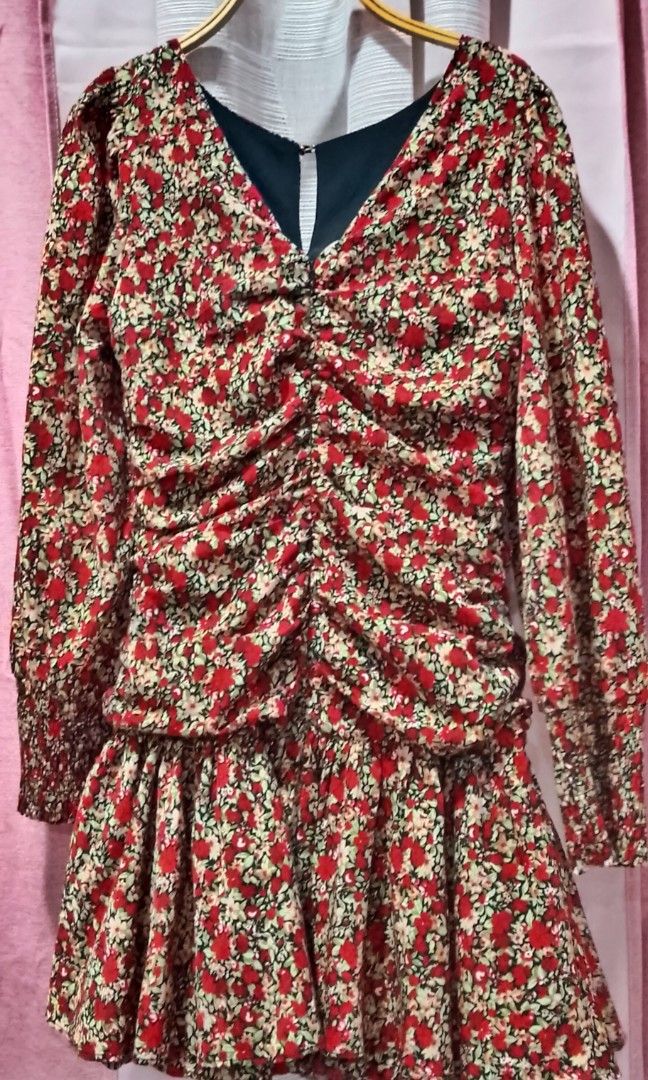 Red floral mini dress (Category: Dresses) located in Cabanatuan. Submitted by miss.maia (Listing ID 1462630835, Image 3). Description: Red floral mini dress with a V-neck, long sleeves, and a gathered, ruched center leading into a ruffled hem..