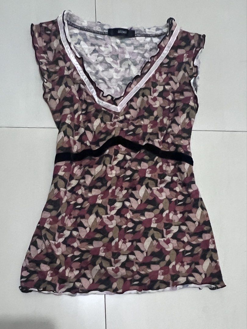 Red Floral V-Neck Top (Category: Blouses) located in Caloocan City. Submitted by guaconerva97479 (Listing ID 1462617651, Image 2). Description: - V-neckline - Pretty floral print (burgundy, beige, grey) - Black velvet ribbon waist detail - Ruffled neckline and hem - size s .