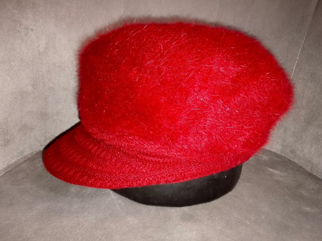 Red Fuzzy Cabbie Hat with Ribbed Knit Visor (Category: Hats & Beanies) located in Binangonan. Submitted by yuristalin888 (Listing ID 1462661795, Image 2). Description: This bright red hat features a voluminous, fuzzy crown with a soft, hair-like texture. The cap contrasts this fluffy upper with a structured front brim and lower band made from a ribbed knit material. As shown in the side profile from the combination of the high-texture body and th