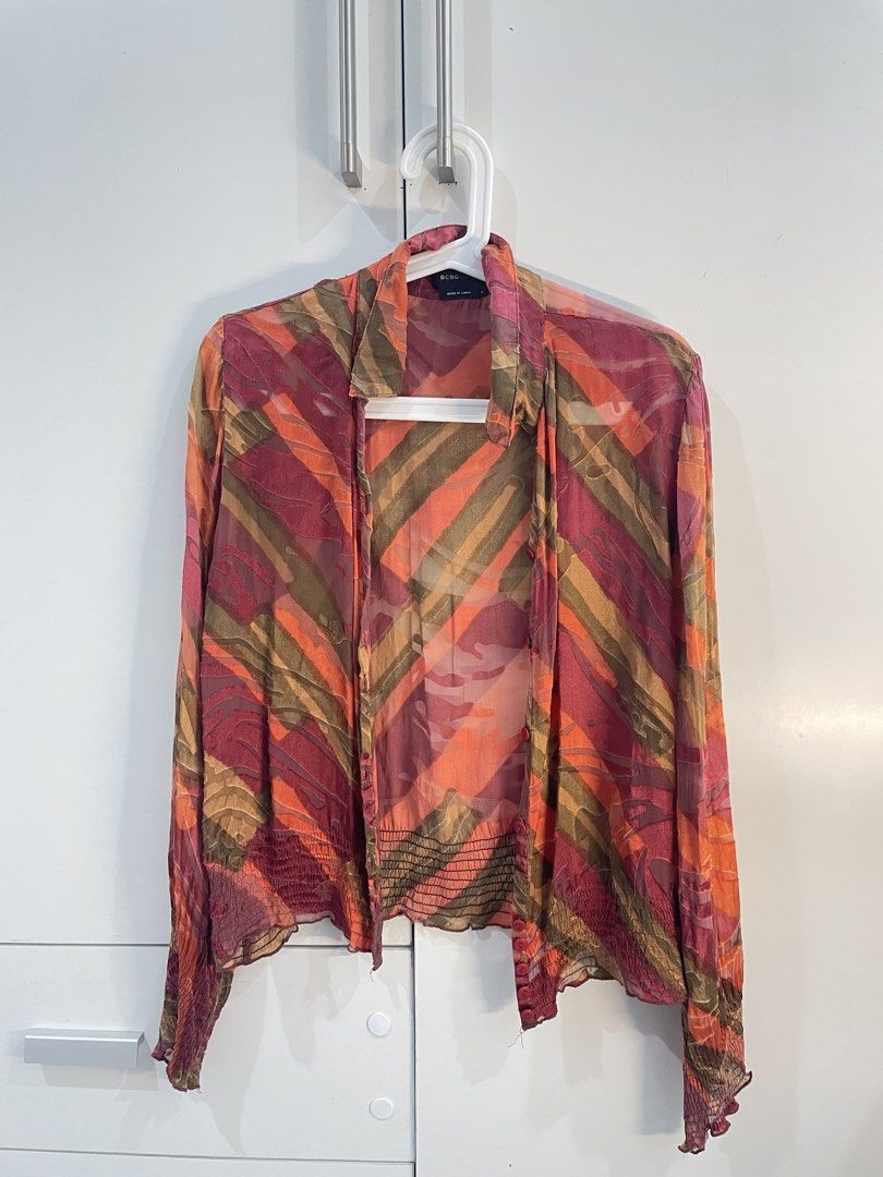 Red Orange Blouse (Category: Blouses) located in Manila. Submitted by raine.star (Listing ID 1462514233, Image 1). Description: Red, orange and green, long sleeves, .