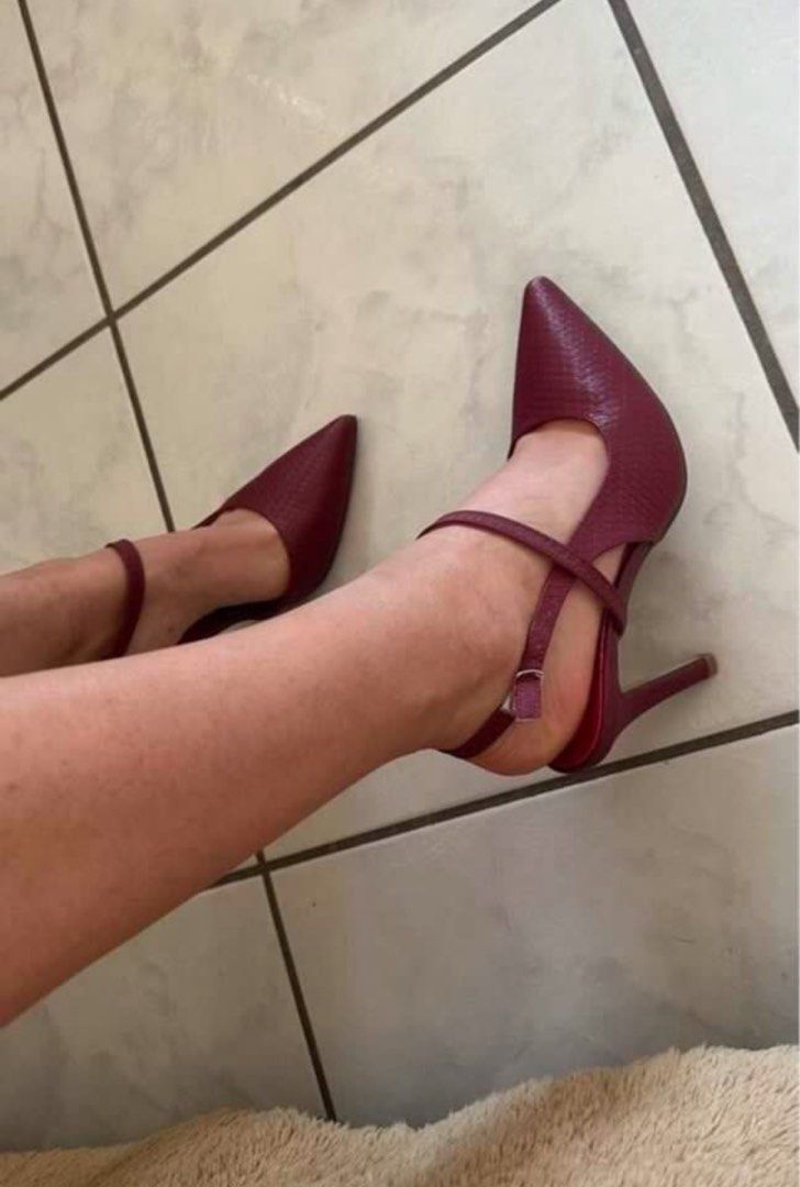 Red Pointed Toe Heels with Ankle Strap (Category: Heels) located in Cebu City. Submitted by gmladz (Listing ID 1462451792, Image 1). Description: - Red pointed toe heels - Textured finish - Adjustable ankle strap - Includes original box - Super chic and versatile for any outfit.