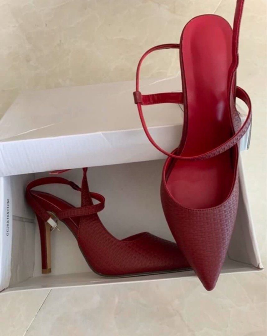 Red Pointed Toe Heels with Ankle Strap (Category: Heels) located in Cebu City. Submitted by gmladz (Listing ID 1462451792, Image 2). Description: - Red pointed toe heels - Textured finish - Adjustable ankle strap - Includes original box - Super chic and versatile for any outfit.