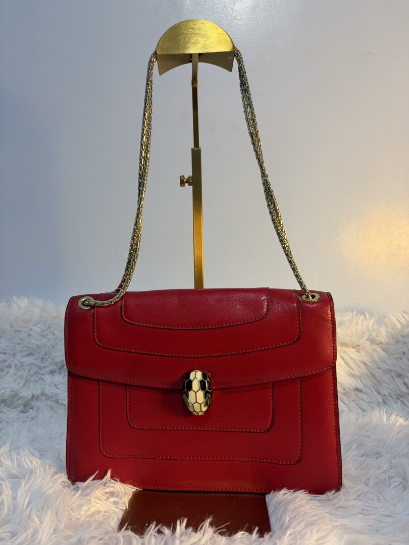 Red two way bag (Category: Cross-body Bags) located in Goa. Submitted by zahar_modern_thrift_bags001 (Listing ID 1462638105, Image 1). Description: In good condition .